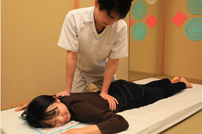 腰椎手根調整